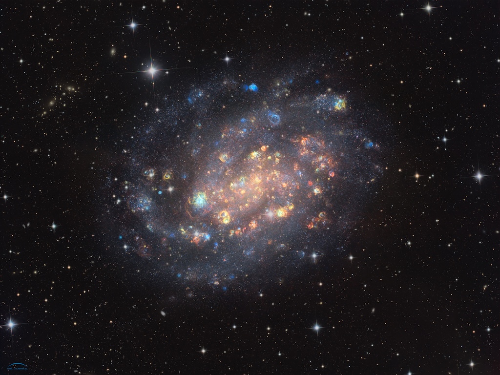 NGC 300: A Cosmic Gemstone with Stars and Gas Clouds